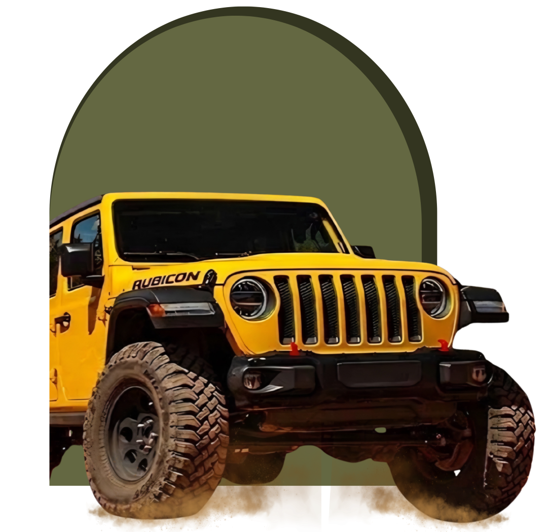 Yellow off-road vehicle with rugged tires on a green arch background.